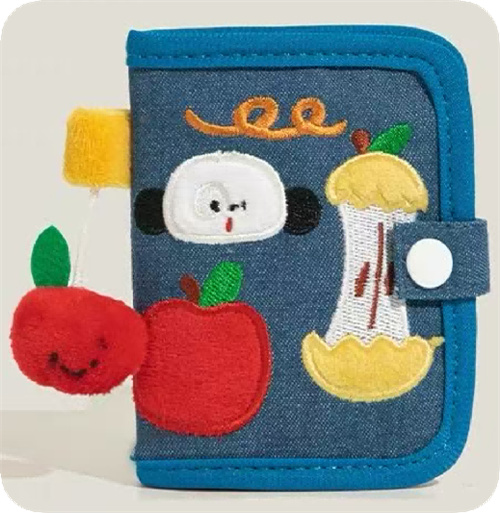 Colorful applique motifs on a fabric organizer