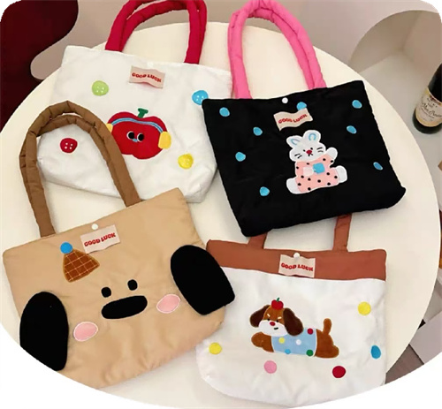 Applique animal motifs on canvas bags