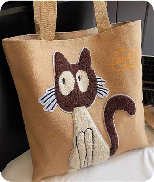 Chenille cat motif on a canvas tote bag