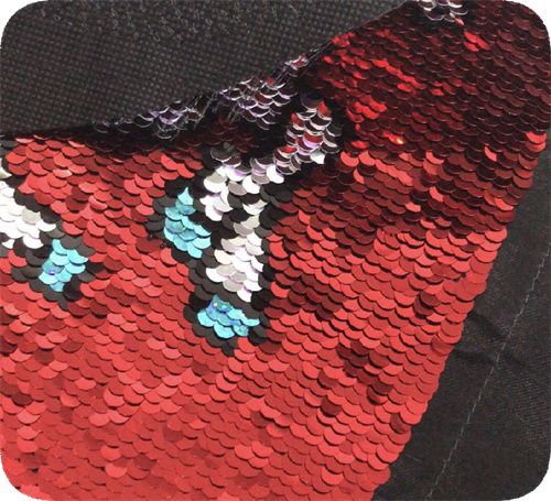 Red and black sequin embroidery detail