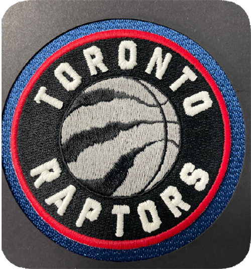 Round embroidered sports badge