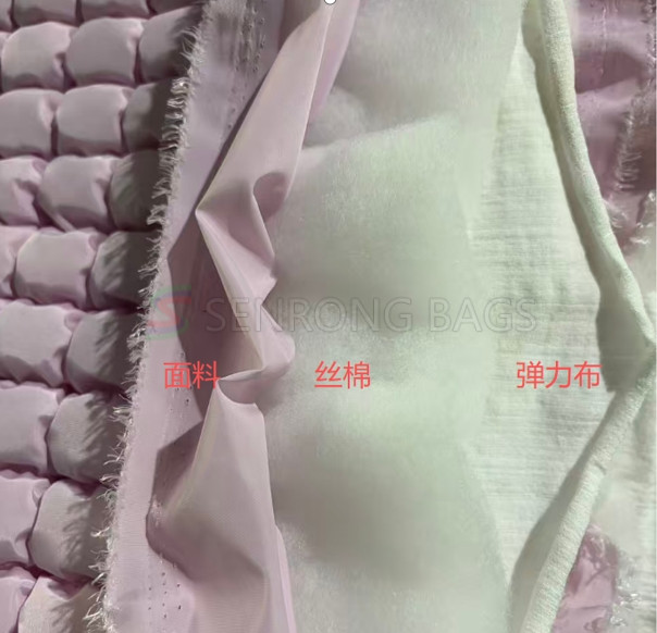 Three-layer cloud cosmetic bag material structure with face fabric, polyester batting, and stretch backing