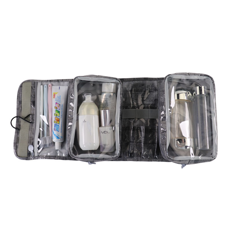 Opened Senrong folding toiletry bag showing clear zippered storage compartments