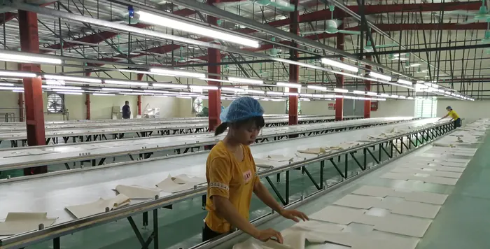 Cut fabric panels being prepared on a production line